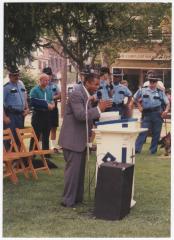 Bishop Ronald T. Fisher addressing crowd in Fountain Park