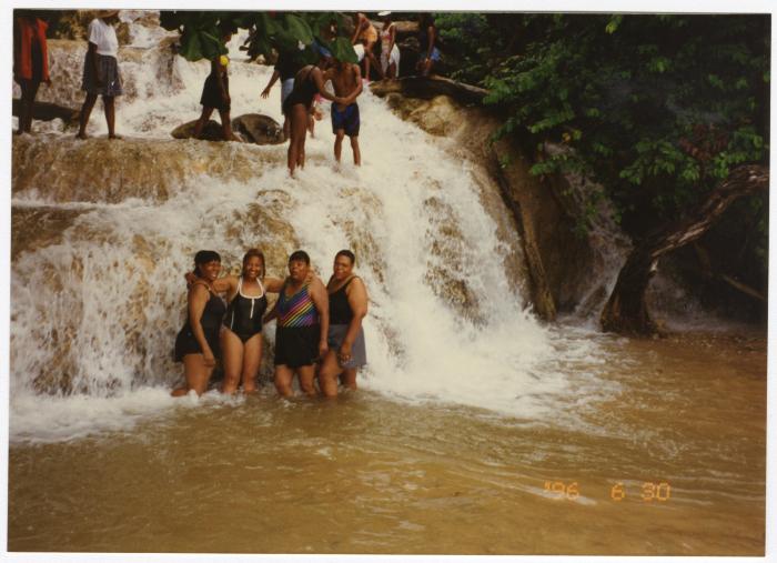 Women in waterfall