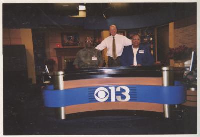 Haywood and Mary Grinnell at the CBS 13 newsdesk 