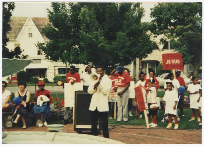 Ronald T. Fisher addressing crowd