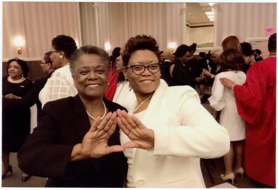 Mary Gilbert Fisher and daughter Chenelle Pettiford at induction 