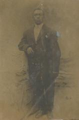 A man posing in a suit