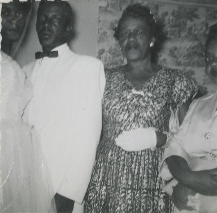 Shirley C. Hamilton and Melvin J. Hamilton on their wedding day with their mothers