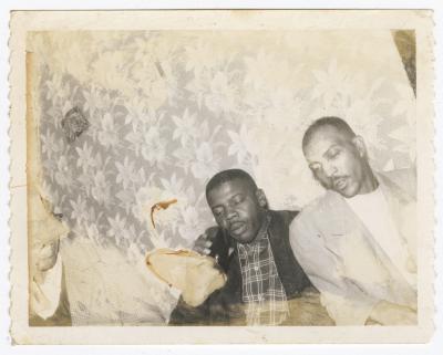 Sam Hopkins and Luther Hamilton seated