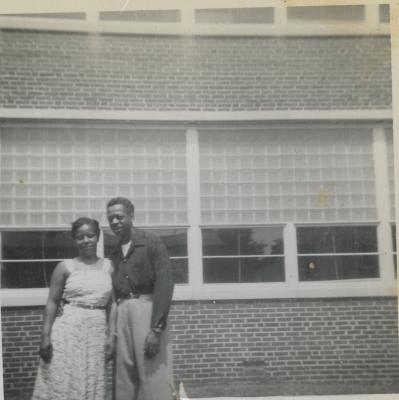 Helen Cann in front of Garnet High school 