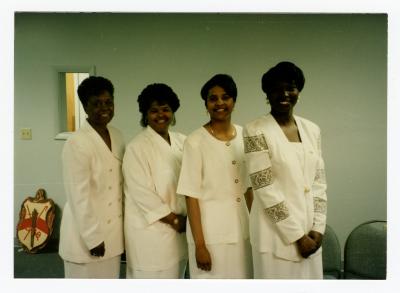 Four women at the Delta Sigma Theta induction