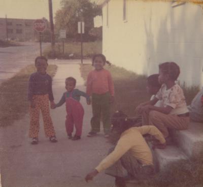 Children playing outside the Gospel Church of God