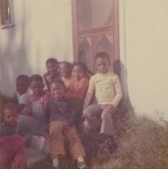 Children sitting outside