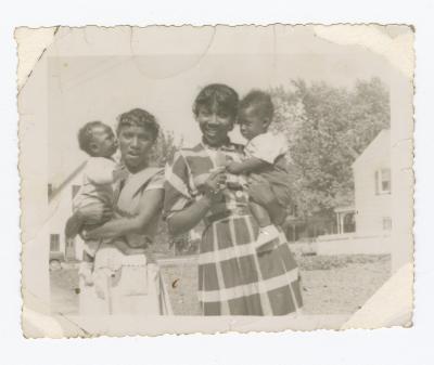 Two young girls with babies