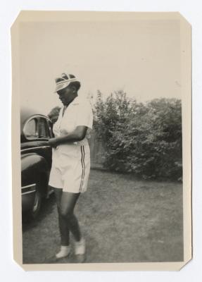 Woman walking towards a car