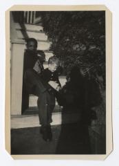 Man and young boy sitting on a staircase