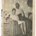 Man and woman sharing an armchair