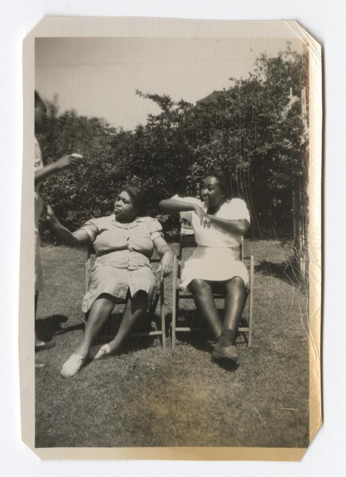 Women laughing in the backyard