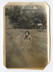 Young woman lying in the grass