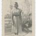 Shirley Dorsey posing in front of a fence