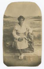 Seated portrait of a woman