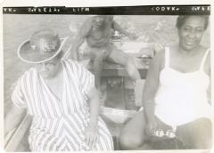 Two women and a man in a boat