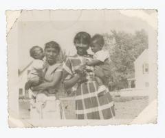 Two young girls with babies