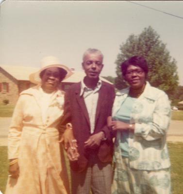 Man with two women on his arms