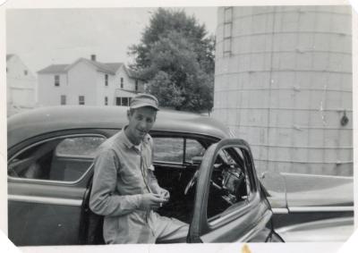 Man leaning in a car door