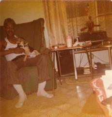 Man sitting with puppy