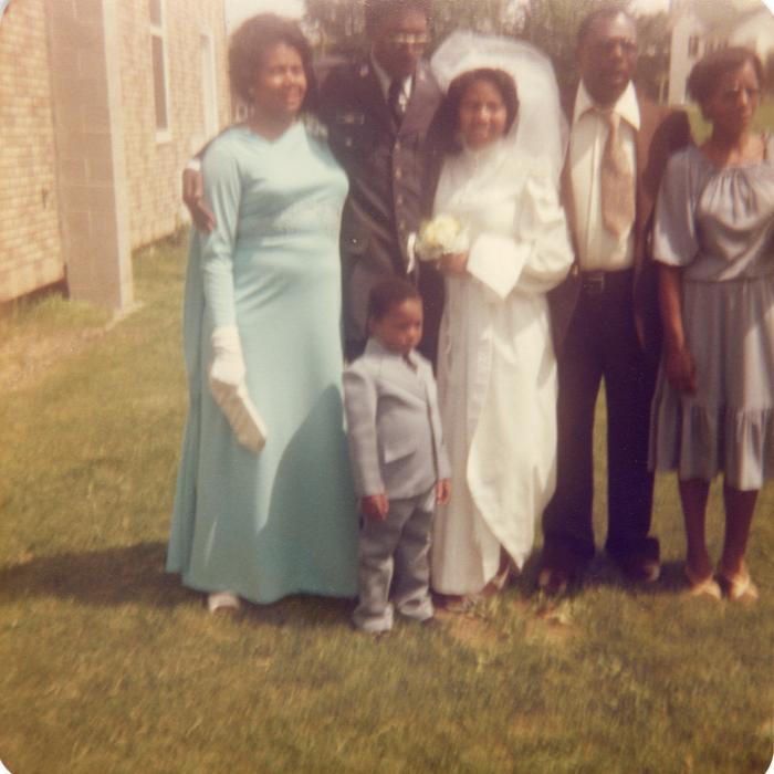 Guests standing with the bride and groom