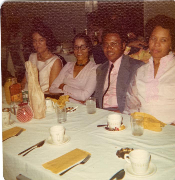 Group seated at banquet table