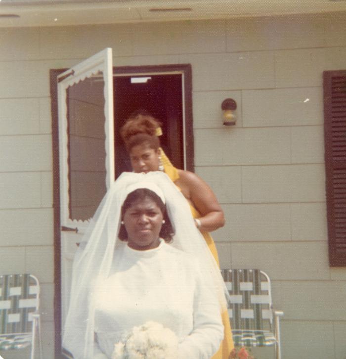 Bride and bridesmaid