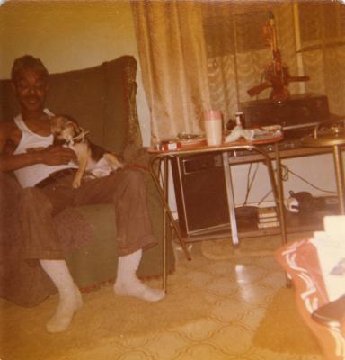 Man sitting with puppy