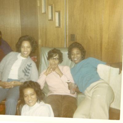 Four women sitting together