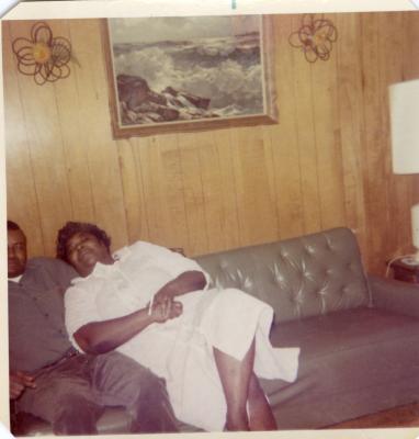 Man and woman relaxing on a couch