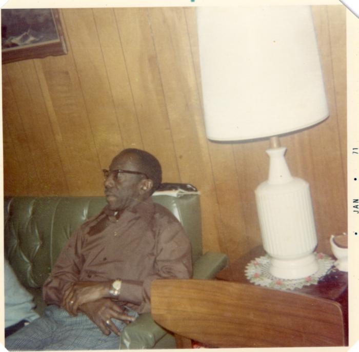 Man sitting on couch