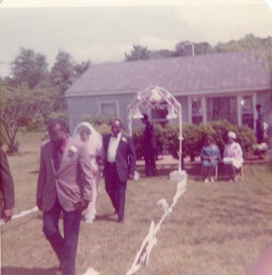 Walking away from the wedding arch
