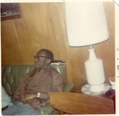 Man sitting on couch