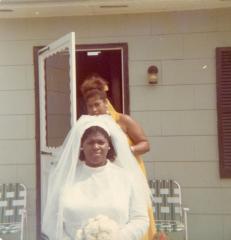 Bride and bridesmaid