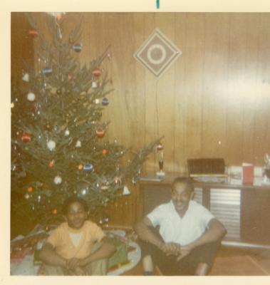 Sitting by the Christmas tree