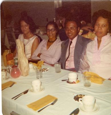 Group seated at banquet table