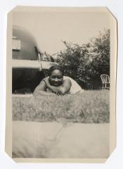 Woman laying in yard