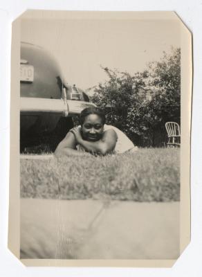 Woman laying in yard