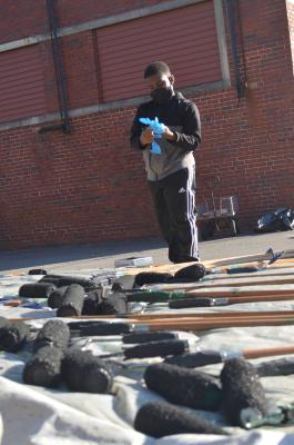 Young Boy with Paint Rollers