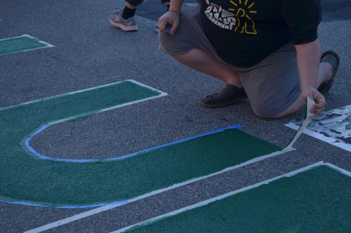 Removing the tape from the Black Lives Matter street mural
