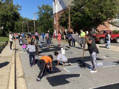 View of North College Avenue during the painting of the Black Lives Matter street mural