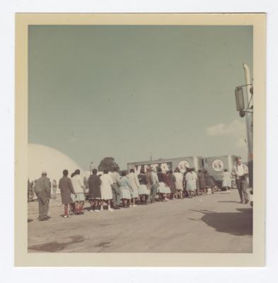 Employees lined up for food in VITA Foods parking lot
