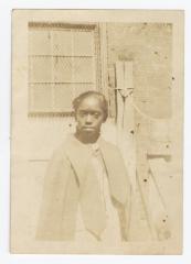 A teenage girl standing outside