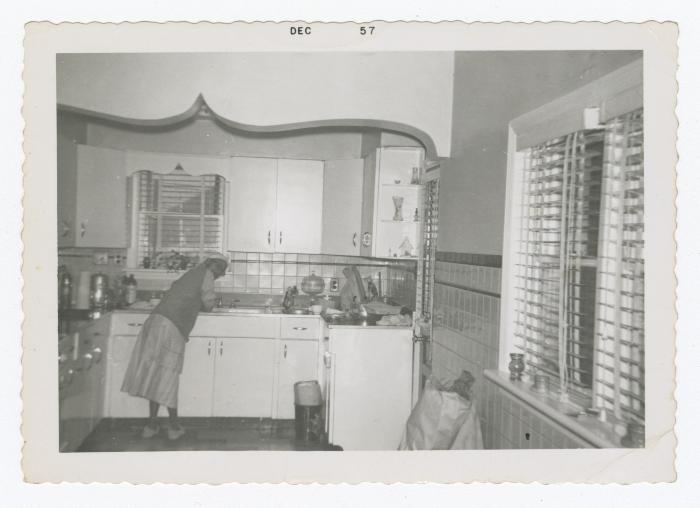 A woman washing dishes