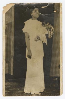 A young woman in a wedding gown