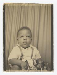 A young child in a chair