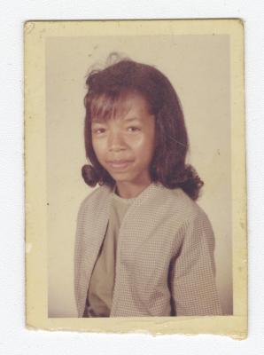 Portrait of a young girl in a cardigan