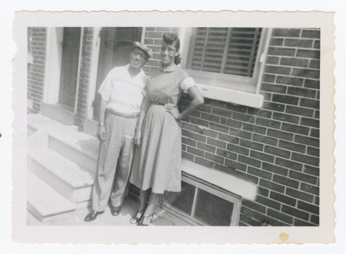 A man and a woman smiling