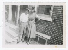 A man and a woman smiling